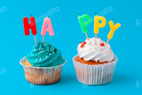 Preview: Happy birthday cupcakes on bright colored background