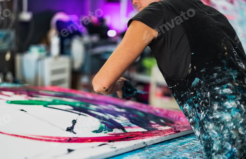 Preview: Woman artist painting on canvas in workshop studio - Painter work and creative craft concept