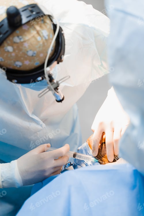 Preview: Surgeon injects anesthesia Blepharoplasty incision Eye region pre-op