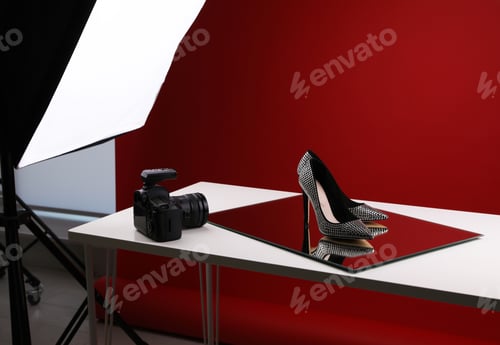 Preview: Professional photography equipment prepared for shooting stylish shoes in studio