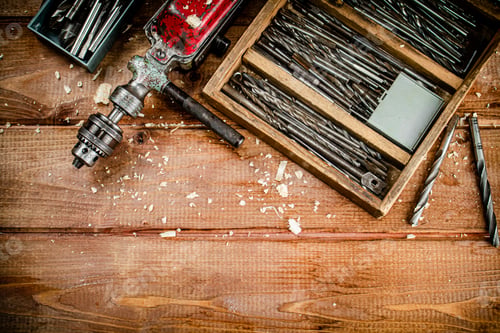 Preview: Hand drill with various drills.