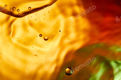 Preview: Beautiful abstract background from mixed water and oil in orange, red and green color