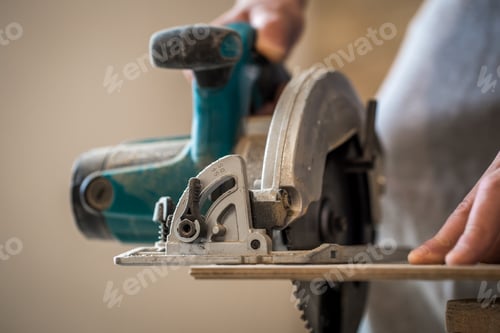 Preview: Hand Saw Cutting Wood in a Workshop