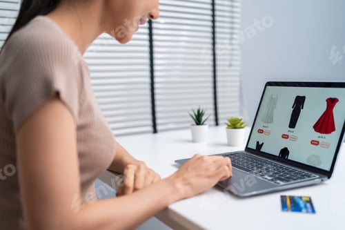Preview: Asian young woman use laptop computer for shopping product sell online.