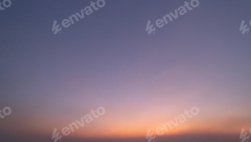 Preview: Sunset sky. Abstract nature background. Dramatic blue and orange, colorful clouds at twilight time.