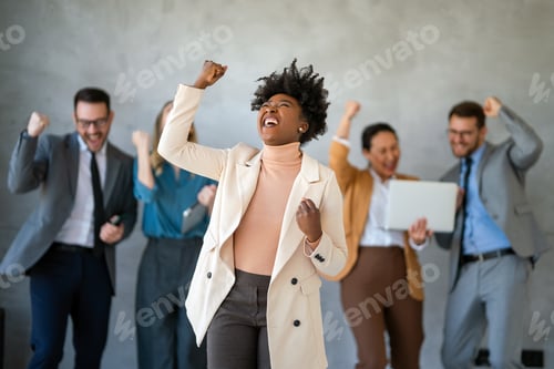 Preview: Success group of multiethnic entrepreneurs and business people achieving goals in corporate office