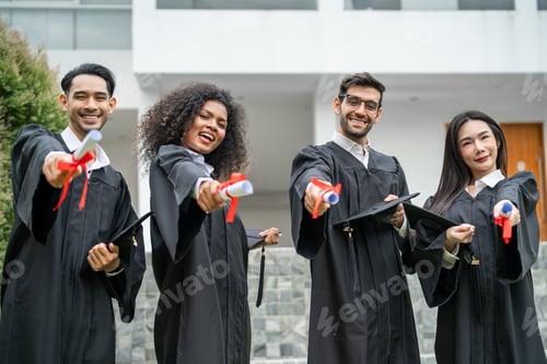 Preview: Group of diverse students celebrating college achievement outside campus.