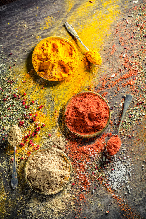 Preview: Vivid spices and herbs on old board