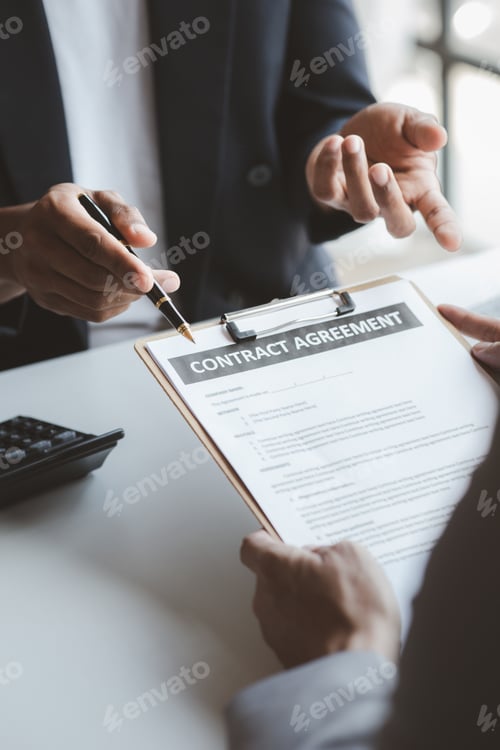 Preview: Rental company employee is calculating the cost for the customer to agree to sign a rental contract