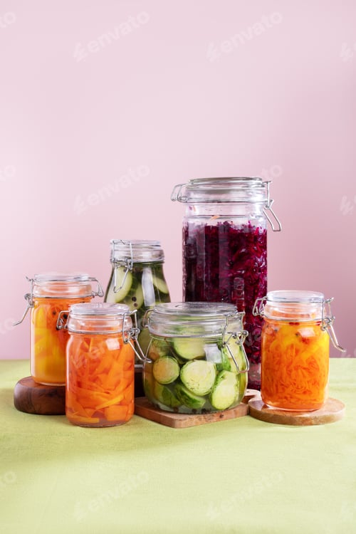 Preview: Assorted fermented foods sauerkraut, pickled vegetables in glass jars for gut health