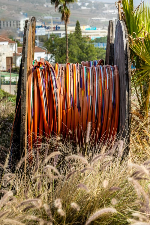 Preview: Vertical shot of the rotated and wrapped colorful heat shrink tubing wires in the field