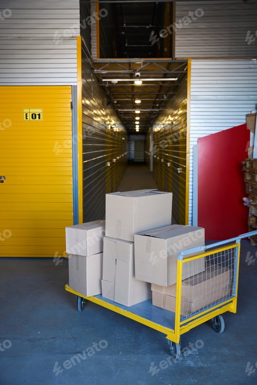 Preview: Cargo trolley on small wheels stands near the containers