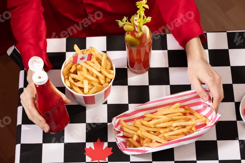 Preview: Canada Day traditional food concept. A girl in a classy cafe eats in Canada. Breakfast and lunch.