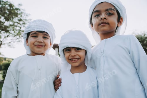 Preview: children playing together in Dubai in the park.