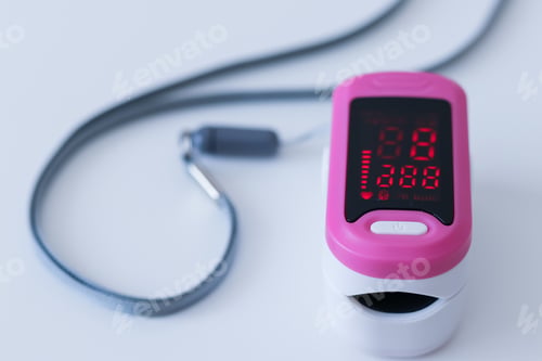 Preview: Pink pulse oximeter on white background