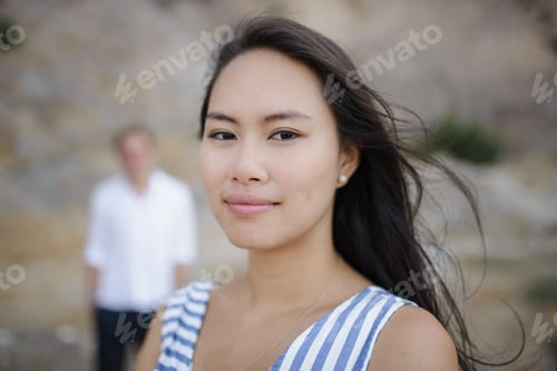 Preview: Young couple walking in the mountains