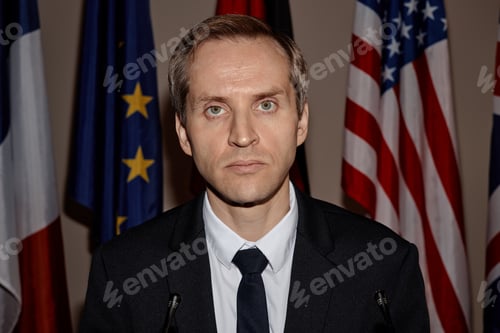 Preview: Portrait of Caucasian Adult Man Speaking at International Conference
