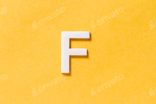 Preview: Letter F of the alphabet isolated on yellow background, top view