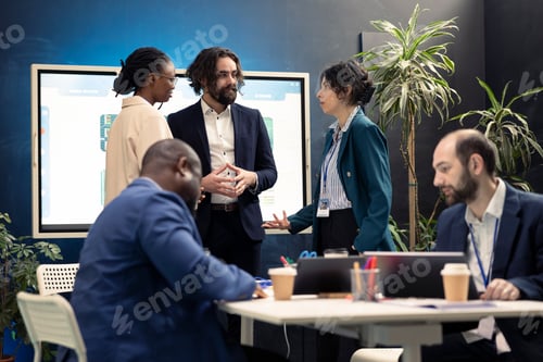 Preview: Team members from a business enterprise discussing insight of new project