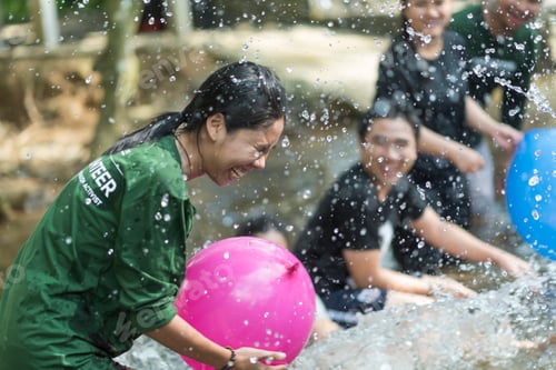 Preview: Young people playing a team with nature locations to Team building in Nakhonnayok, Thailand