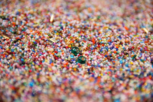 Preview: Colorful beads on a white background.