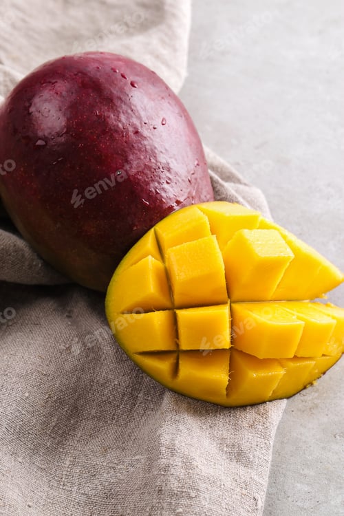 Fresh Mango Fruit Slices on Linen Cloth