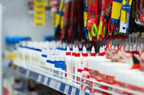 Preview: assortment of scissors and glue in stationery shop