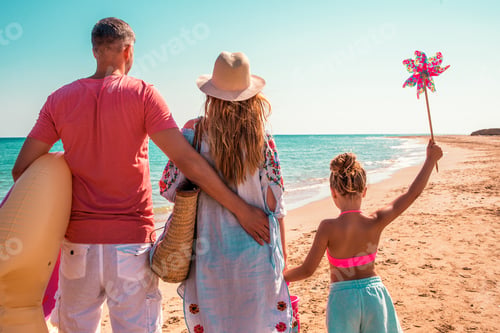 Preview: Happy Family Enjoying a Sunny Beach Vacation Together