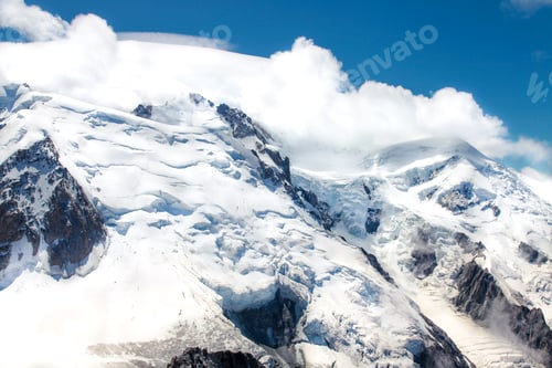 Preview: French Alp mountains covered in fresh white snow. Mountaineering, travelling.