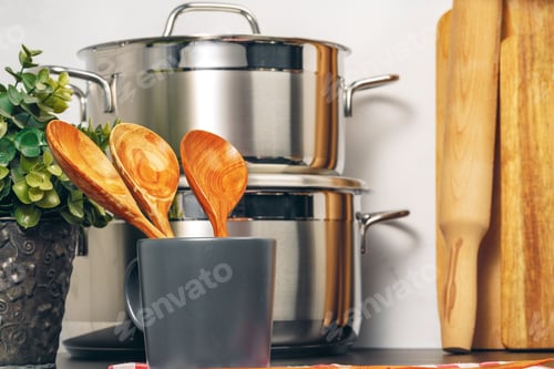 Preview: Set of cookware utensils on a kitchen counter