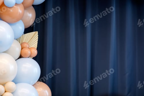 Preview: Balloons garland for little baby party on a blue background.