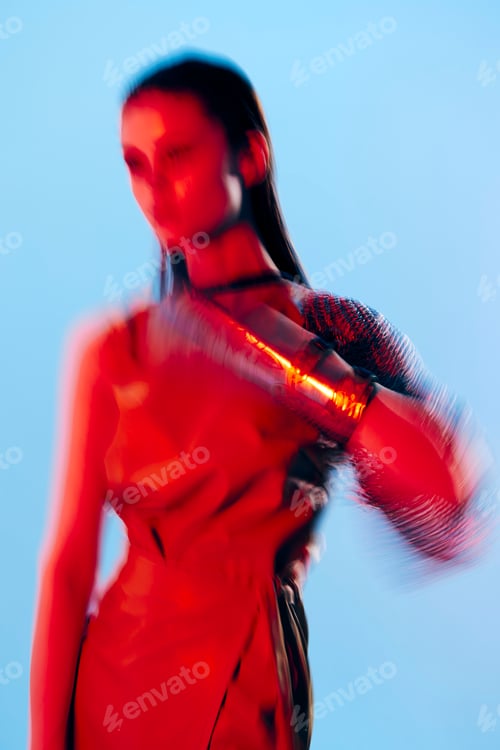 Preview: attractive woman red light silver armor chain mail fashion unaltered