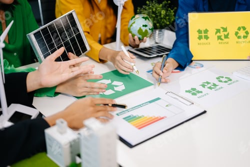 Preview: Asian professionals collaborate on sustainable energy solutions with wind turbines, solar panels,