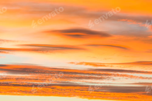 Orange and Yellow Clouds at Sunrise or Sunset