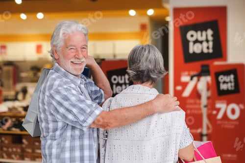 Preview: Senior Couple Enjoying Shopping Trip Together at Outlet