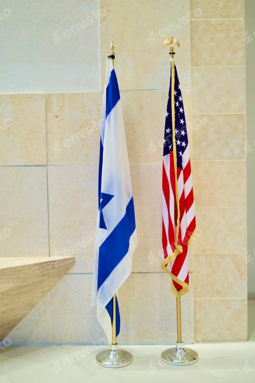 Preview: Israeli flag next to the American flag in a minimal setting.