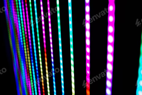 Preview: Detail of colored lighting led strips lit in the dark.