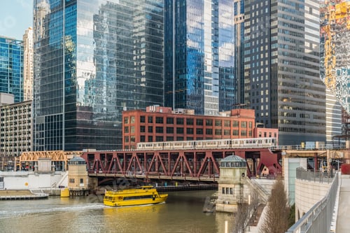 Preview: Chicago River walk with Yacht running and traing running over the rail track, illinois, USA
