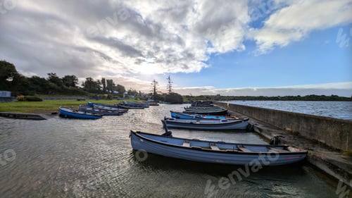 Preview: Old wooden fishing boats in Corrib lake at Annaghdown pier, county Galway, Ireland, nature backgroun