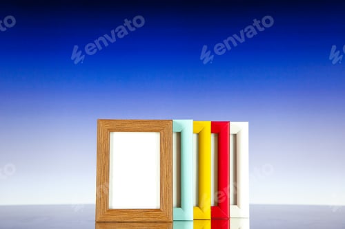 Preview: front view different picture frames with colored corners on light blue background picture family