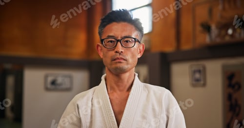 Preview: Japanese man, sensei and portrait for martial arts practice or traditional sport, fighting and heal