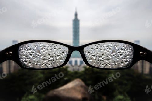 Preview: Closeup shot of glasses covered with water drops on a blurred background in Taipei, Taiwan