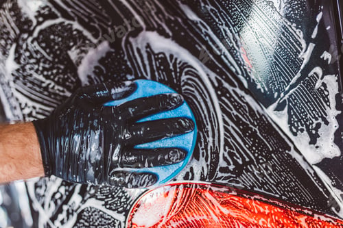 Preview: Washing car before detailing in workshop.