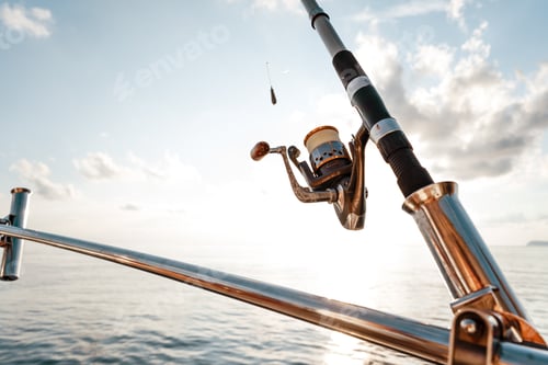 Preview: Fishing rod on a sailboat on the background of the sea
