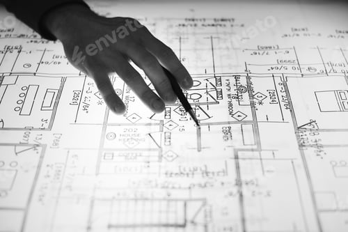 Preview: Close up of hands working on layout