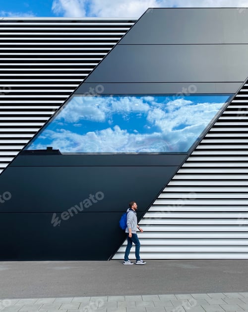 Preview: man walking down the street