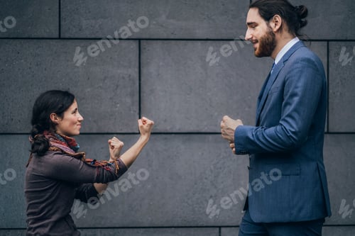 Preview: Businessman and woman fighting