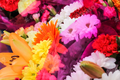 Preview: Selective focus shot of colourful flower bouquets in the shop