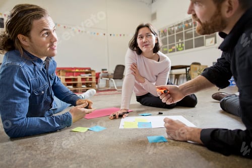 Preview: People brainstorming in meeting