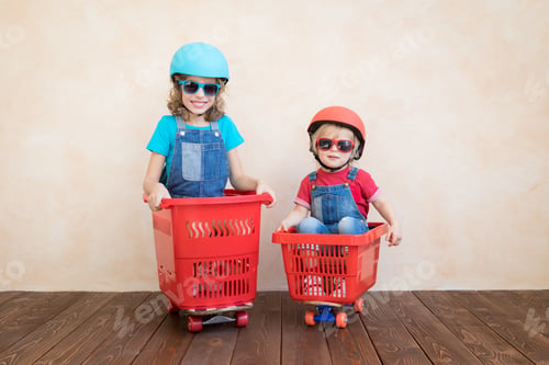 Preview: Happy children driving toy car at home